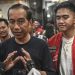 Kunjungi Lampung, Jokowi Kenakan Kemeja dan Topi Berlogo PSI